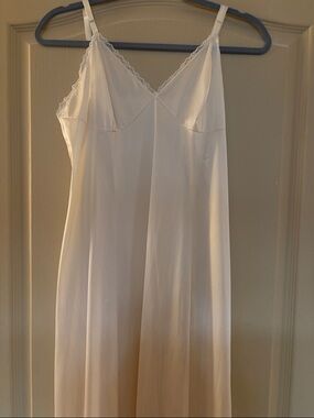 Vanity Fair Ivory Satin Slip with Lace Trim. 38 P
